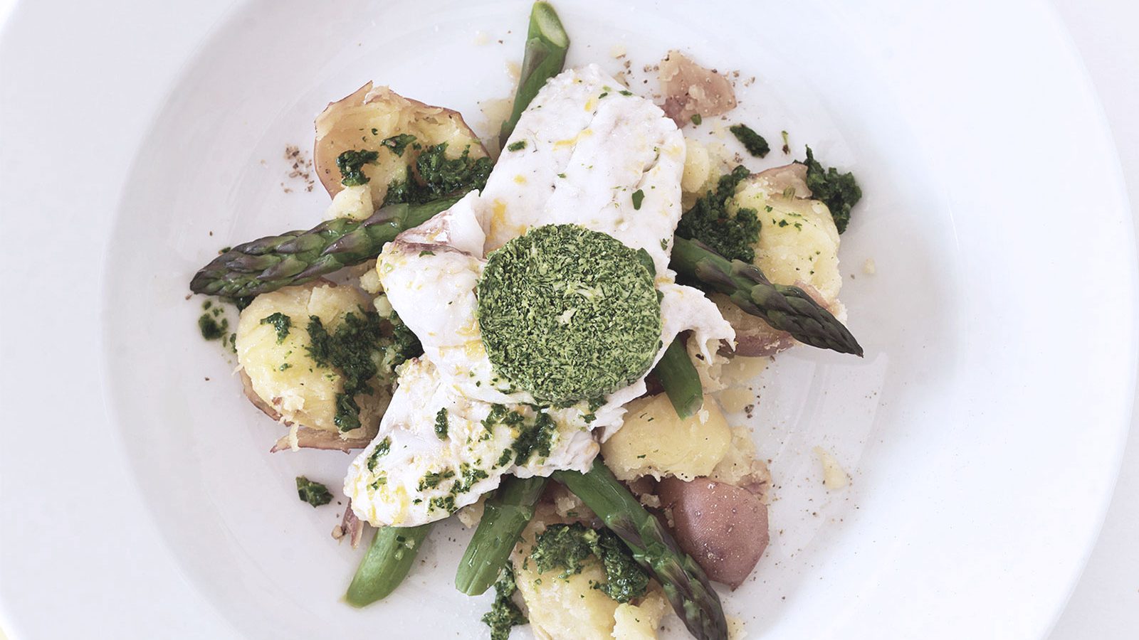 Chicken with stuffed asparagus, asparagus sauce, and grilled potatoes