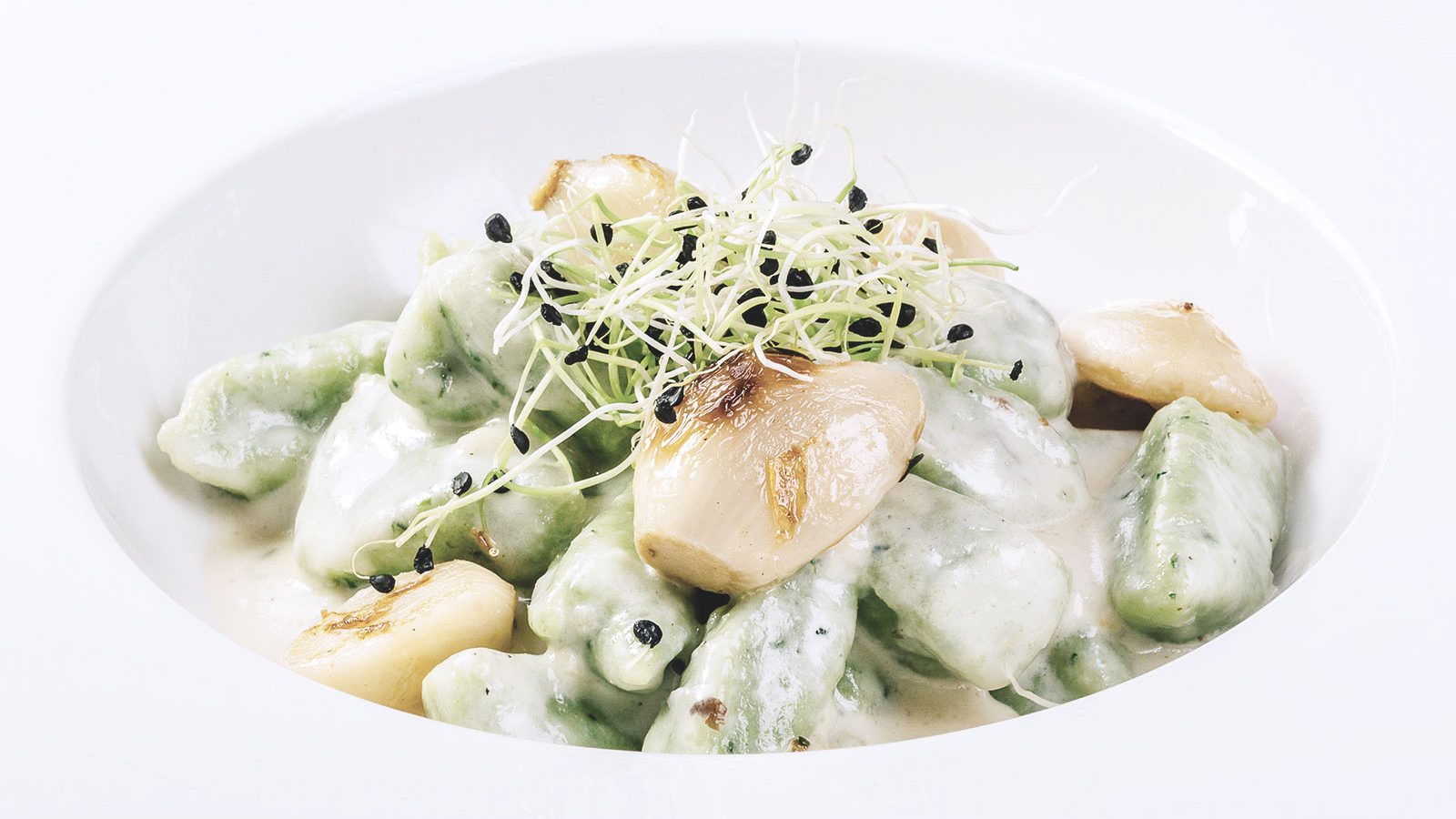 Potato gnocchi in gorgonzola cheese and roquet sauce